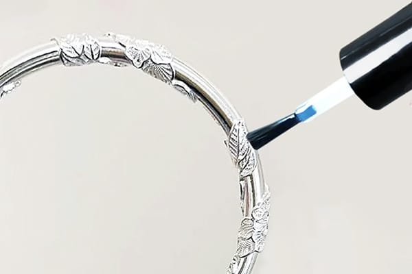 Applying Clear Nail Polish to Jewelry