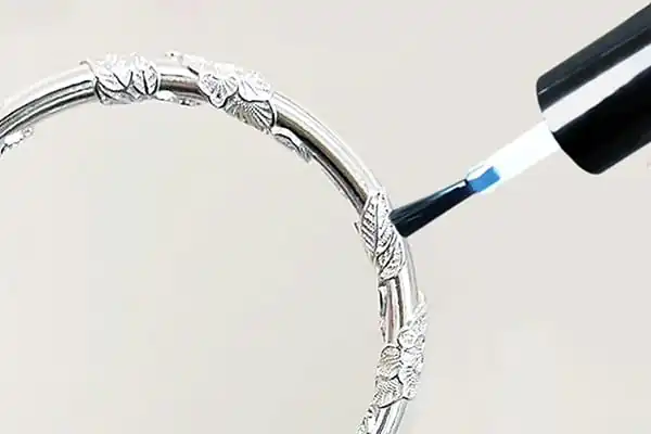 Applying Clear Nail Polish to Jewelry