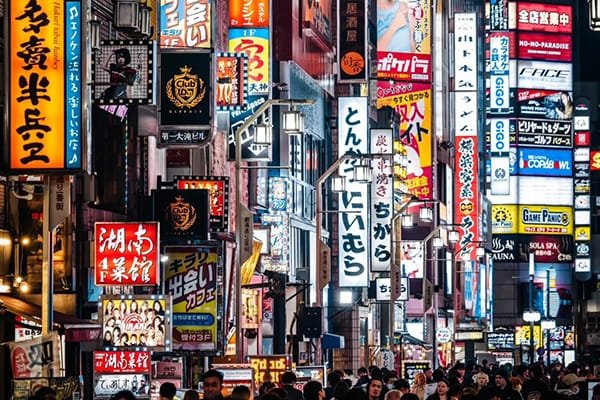 Cluttered City Street with Traditional Ads
