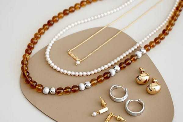 Jewelry Pieces with Metal Contrast and Stains