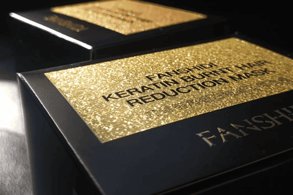 Elegant black packaging with gold foil embossing