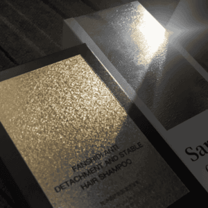 Elegant gold foil packaging reflecting sunlight
