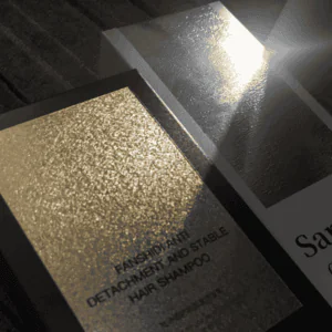 Elegant gold foil packaging reflecting sunlight