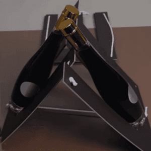 Black cardboard wine rack holding two bottles