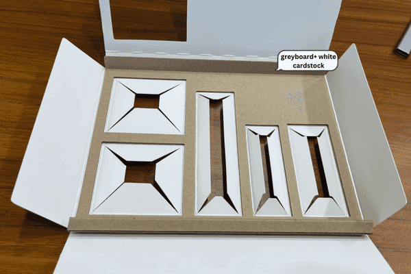 Custom cardboard insert with precision-cut slots.