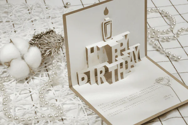 Elegant pop-up birthday card with candle design.