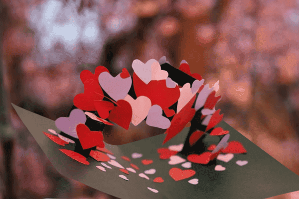 Romantic pop-up card with cascading heart design.
