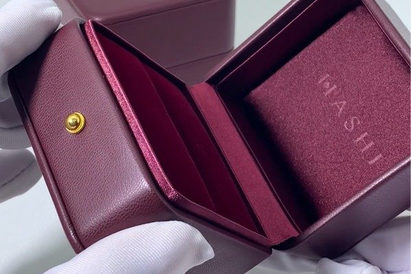Use image: close-up samples of gold foil, blind deboss, spot UV, and matte lamination on jewelry boxes Jewelry box finish options foil deboss and spot UV