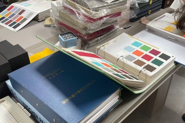 Jewelry box material swatches including PU leather microfiber leather and specialty paper Jewelry box material swatches including PU leather, microfiber leather, velvet, and specialty paper