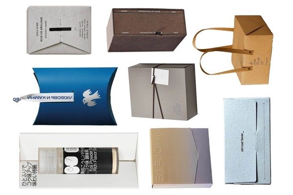 small business founder comparing packaging samples